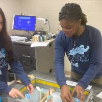 Students competing in the optics event.